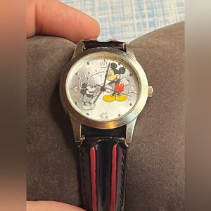 Vintage Disney Mickey Throughout the Years Watch with Black and Red Strap